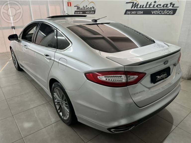 FORD - FUSION 2.0 TITANIUM AWD 16V 4P AUTOMÁTICO - 2013/2013 - PRATA - R$ 77.000,00