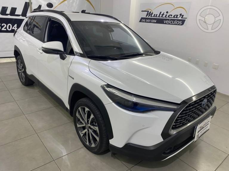 TOYOTA - COROLLA 1.8 CROSS XRV 16V HÍBRIDO 4P AUTOMÁTICO - 2021/2022 - BRANCA - R$ 148.900,00