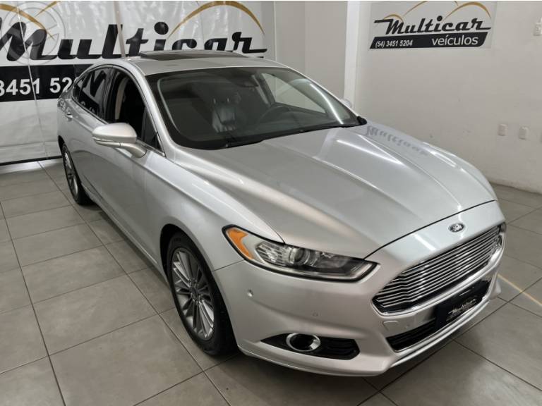 FORD - FUSION 2.0 TITANIUM AWD 16V 4P AUTOMÁTICO - 2013/2013 - PRATA - R$ 77.000,00