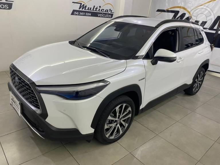 TOYOTA - COROLLA 1.8 CROSS XRV 16V HÍBRIDO 4P AUTOMÁTICO - 2021/2022 - BRANCA - R$ 148.900,00