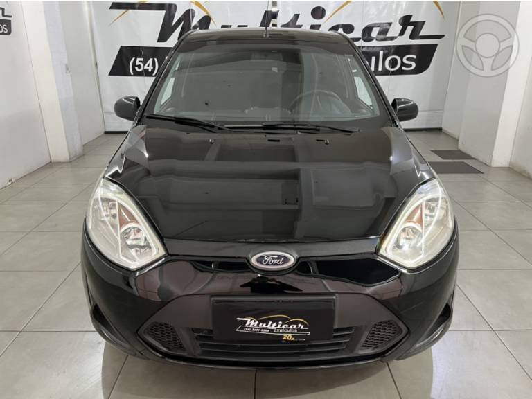 FORD - FIESTA 1.0 ROCAM HATCH 8V FLEX 4P MANUAL - 2013/2014 - PRETA - R$ 34.900,00