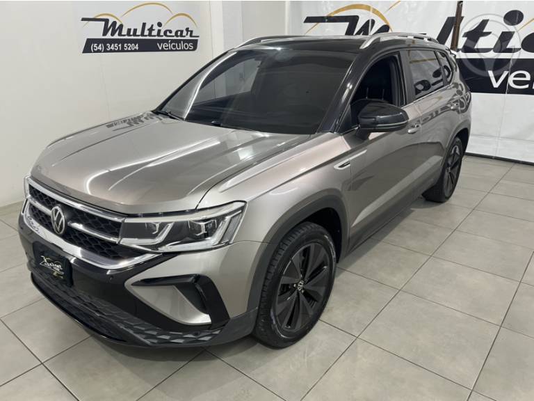 VOLKSWAGEN - TAOS 1.4 16V HIGHLINE TSI FLEX 4P AUTOMÁTICO - 2022/2022 - BEGE - R$ 147.900,00