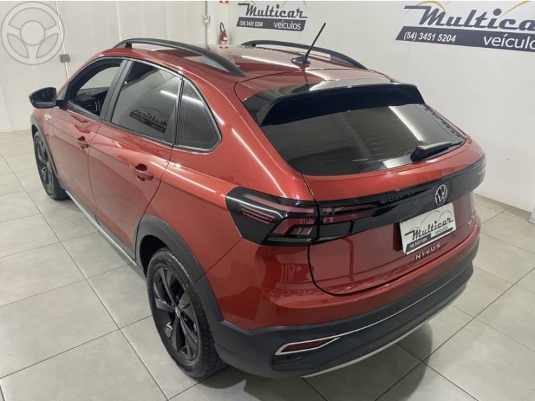 VOLKSWAGEN - NIVUS 1.0 TSI HIGHLINE FLEX 4P AUTOMÁTICO - 2022/2023 - VERMELHA - R$ 123.900,00