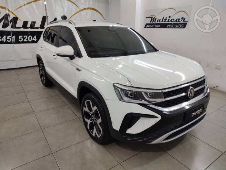 VOLKSWAGEN - TAOS 1.4 16V HIGHLINE TSI FLEX 4P AUTOMÁTICO - 2024/2024 - BRANCA - R$ 174.000,00