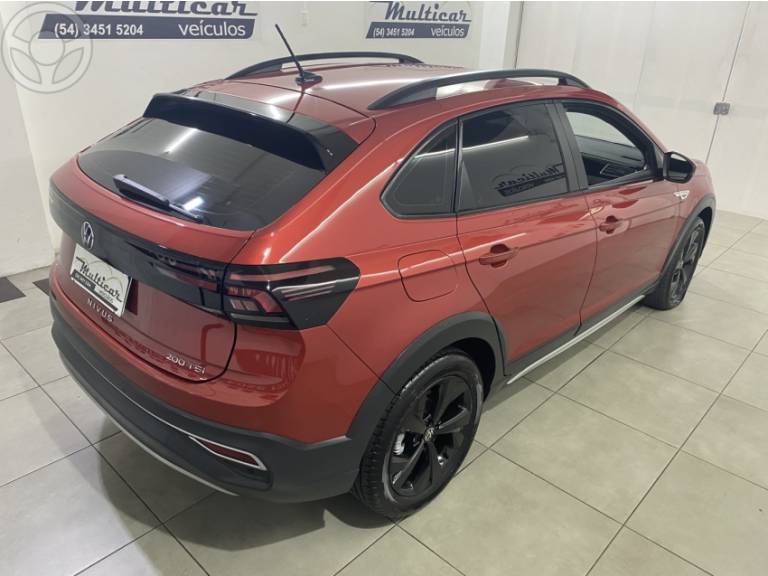 VOLKSWAGEN - NIVUS 1.0 TSI HIGHLINE FLEX 4P AUTOMÁTICO - 2022/2023 - VERMELHA - R$ 123.900,00