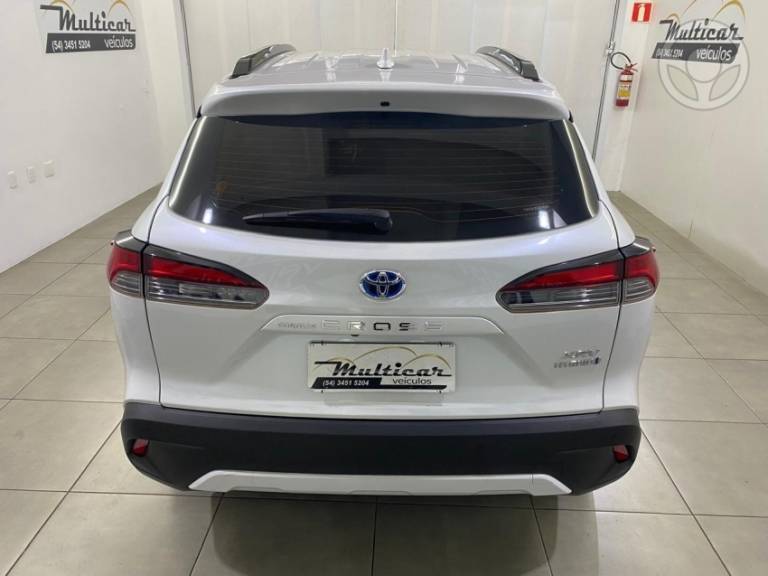 TOYOTA - COROLLA 1.8 CROSS XRV 16V HÍBRIDO 4P AUTOMÁTICO - 2021/2022 - BRANCA - R$ 148.900,00