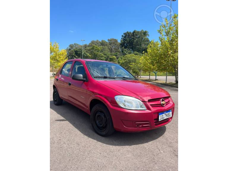 CHEVROLET - CELTA 1.0 MPFI SPIRIT 8V FLEX 4P MANUAL - 2009/2010 - VERMELHA - R$ 22.500,00