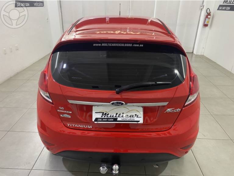 FORD - FIESTA 1.6 TITANIUM HATCH 16V FLEX 4P AUTOMÁTICO - 2013/2014 - VERMELHA - R$ 46.900,00