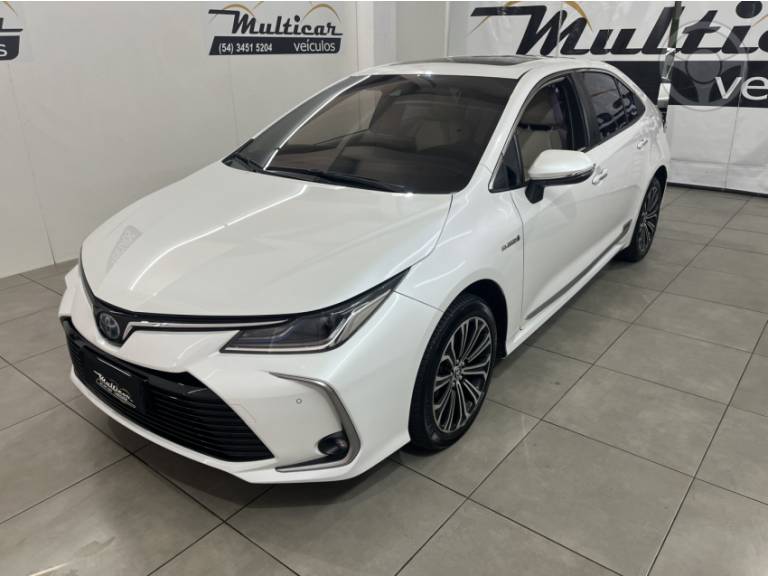 TOYOTA - COROLLA 1.8 ALTIS PREMIUM 16V HÍBRIDO 4P AUTOMÁTICO - 2022/2023 - BRANCA - R$ 149.900,00